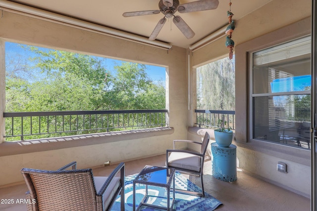 balcony featuring ceiling fan