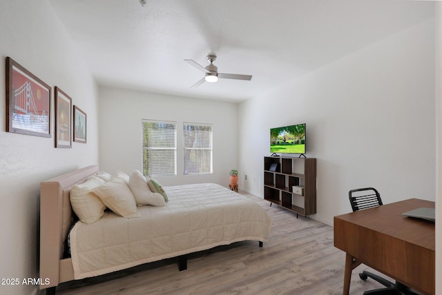 bedroom featuring light hardwood / wood-style flooring and ceiling fan