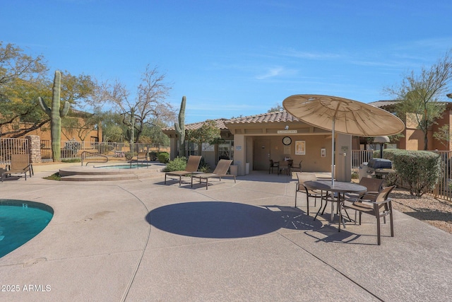 view of patio / terrace with a community pool