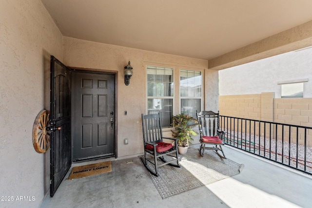 property entrance featuring a balcony