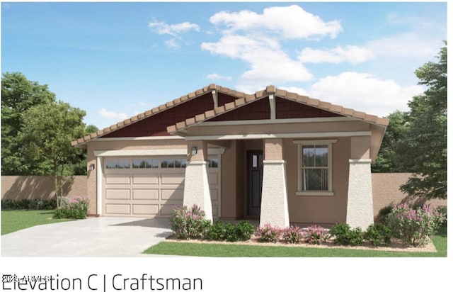 view of front of home with a garage, fence, driveway, a tiled roof, and stucco siding