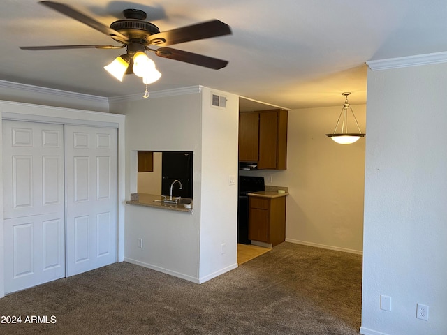 kitchen with ceiling fan, sink, crown molding, light carpet, and black range