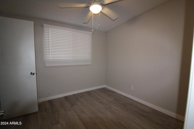 5918 S Grover Cyn Rd, Claypool, AZ 85532 - empty room with wood finished floors, baseboards, and a ceiling fan