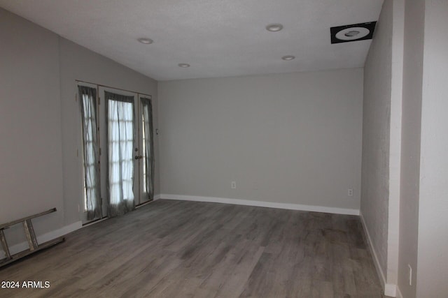 5918 S Grover Cyn Rd, Claypool, AZ 85532 - empty room featuring wood finished floors, baseboards, and recessed lighting