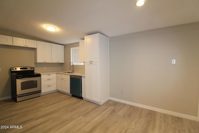 5918 S Grover Cyn Rd, Claypool, AZ 85532 - kitchen with stainless steel electric range, dishwashing machine, a sink, and light wood-style floors