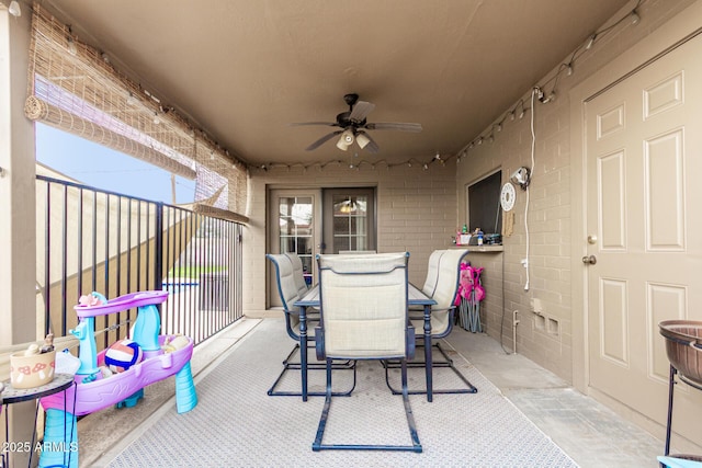 view of patio / terrace with outdoor dining space and a ceiling fan