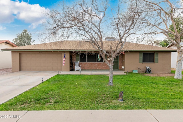 ranch-style home featuring an attached garage, brick siding, driveway, and a front yard