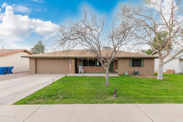 ranch-style home featuring a front yard, concrete driveway, brick siding, and an attached garage