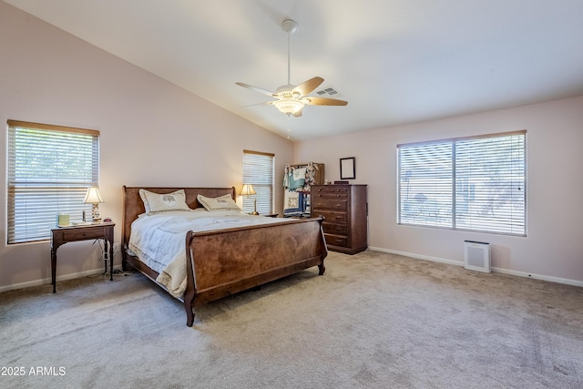 carpeted bedroom featuring vaulted ceiling and ceiling fan