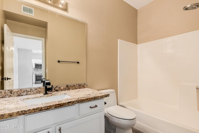 full bathroom with vanity, bathing tub / shower combination, toilet, and visible vents