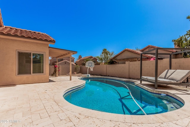 view of pool featuring a fenced in pool, a patio, and a fenced backyard