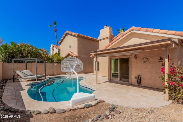 view of pool featuring a fenced in pool, a patio, and a fenced backyard