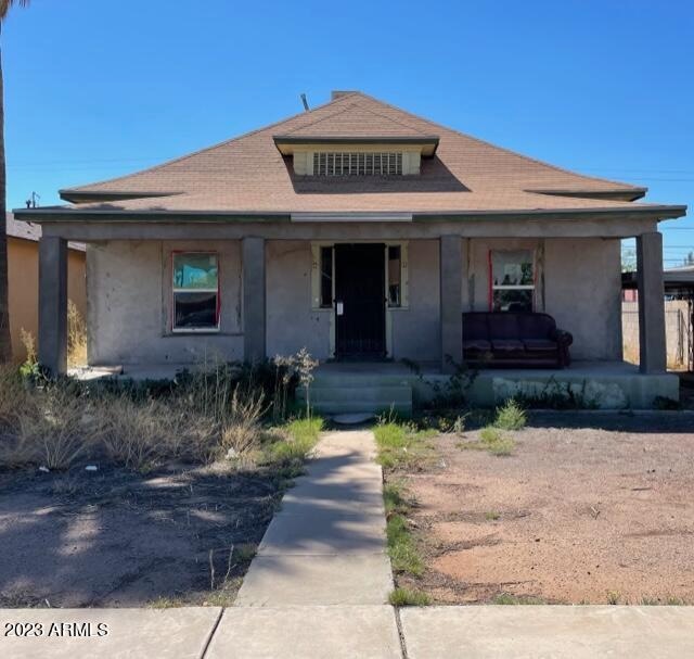 view of front of home featuring covered porch