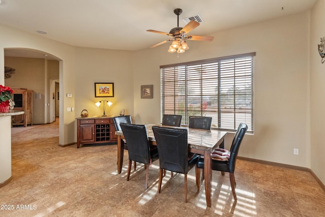 dining area featuring ceiling fan