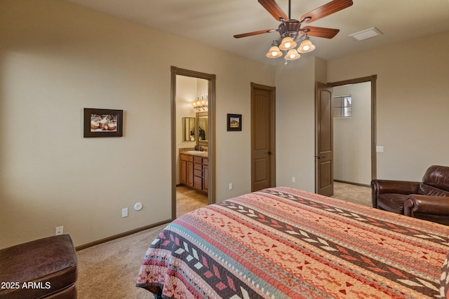 carpeted bedroom featuring connected bathroom and ceiling fan