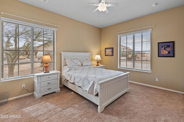 bedroom with ceiling fan and carpet flooring