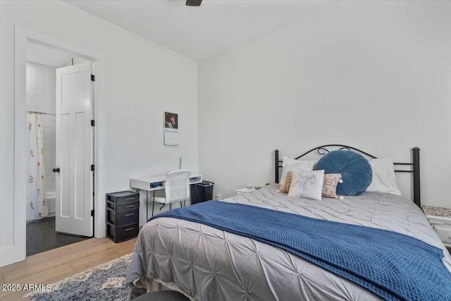 bedroom featuring wood finished floors
