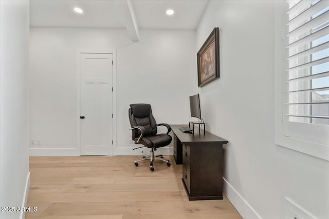 office featuring light wood-type flooring, recessed lighting, baseboards, and beam ceiling