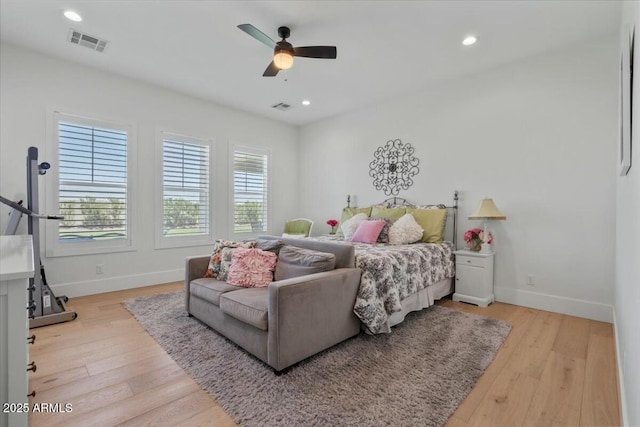 bedroom with baseboards, wood finished floors, recessed lighting, and a ceiling fan