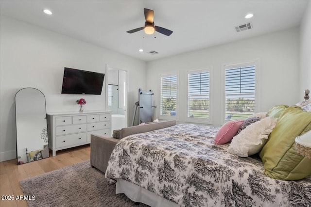 bedroom featuring light wood-style floors, recessed lighting, and ceiling fan