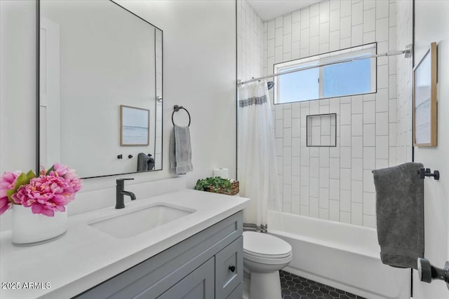 bathroom with vanity, toilet, shower / bath combo, and tile patterned floors
