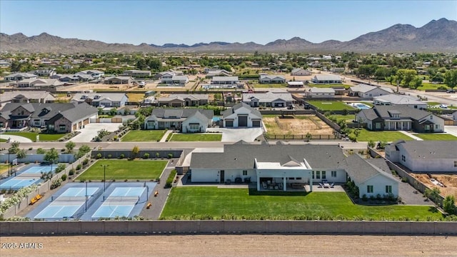 aerial view of residential area with mountains