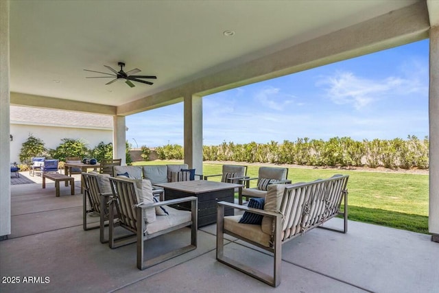 view of patio with outdoor lounge area and ceiling fan