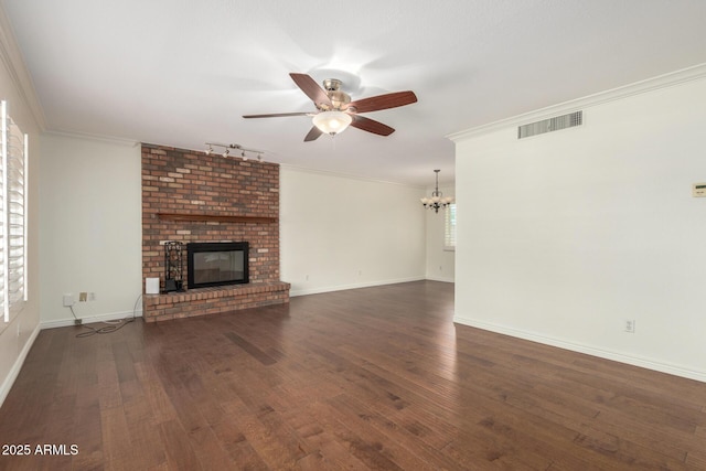 2547 W Naranja Ave, Mesa, AZ 85202 - unfurnished living room featuring a ceiling fan, a brick fireplace, wood finished floors, a chandelier, and ornamental molding