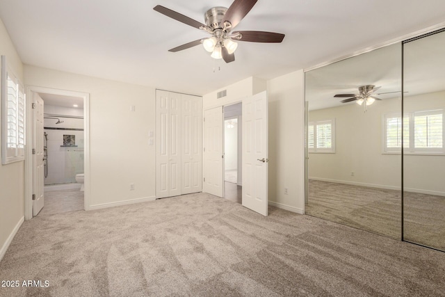 2547 W Naranja Ave, Mesa, AZ 85202 - unfurnished bedroom with carpet floors, connected bathroom, and a ceiling fan