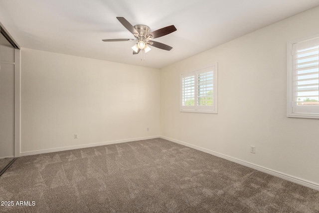 2547 W Naranja Ave, Mesa, AZ 85202 - empty room with plenty of natural light, carpet flooring, and ceiling fan