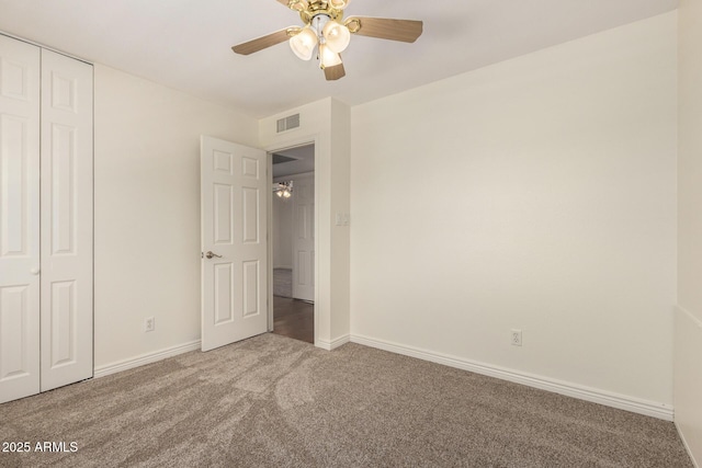 2547 W Naranja Ave, Mesa, AZ 85202 - unfurnished bedroom with carpet floors, a closet, and a ceiling fan