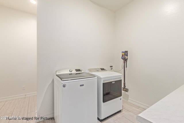 washroom featuring separate washer and dryer