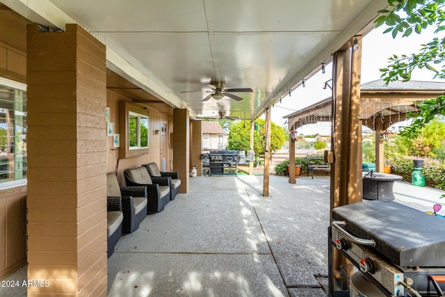 view of patio featuring ceiling fan and area for grilling