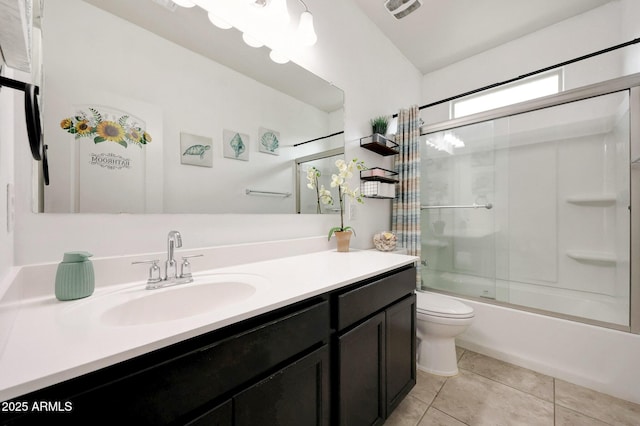 30777 W Whitton Ave, Buckeye, AZ 85396 - bathroom featuring toilet, vanity, bath / shower combo with glass door, and tile patterned flooring