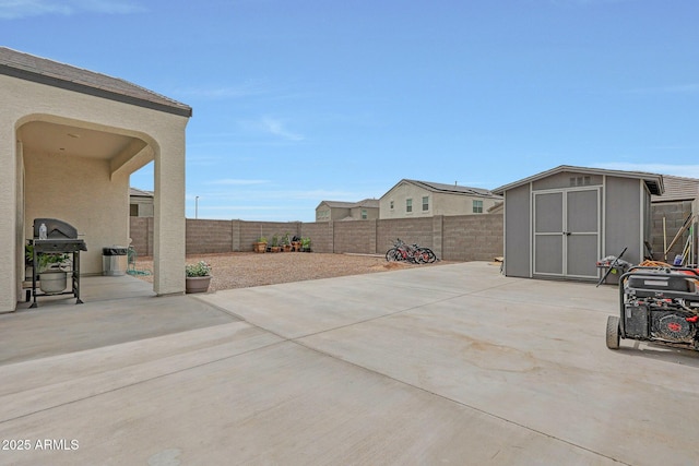 30777 W Whitton Ave, Buckeye, AZ 85396 - fenced backyard with a patio and grilling area