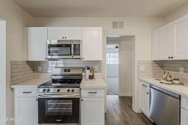1616 E Pecan Rd, Phoenix, AZ 85040 - kitchen featuring stainless steel appliances, white cabinetry, and light countertops