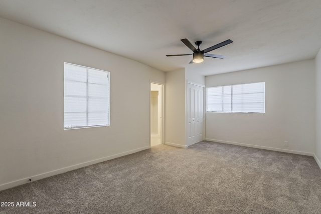 1616 E Pecan Rd, Phoenix, AZ 85040 - unfurnished bedroom with carpet, a closet, and a ceiling fan