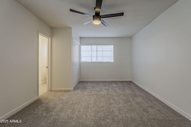 1616 E Pecan Rd, Phoenix, AZ 85040 - unfurnished bedroom with carpet floors, ceiling fan, and ensuite bathroom