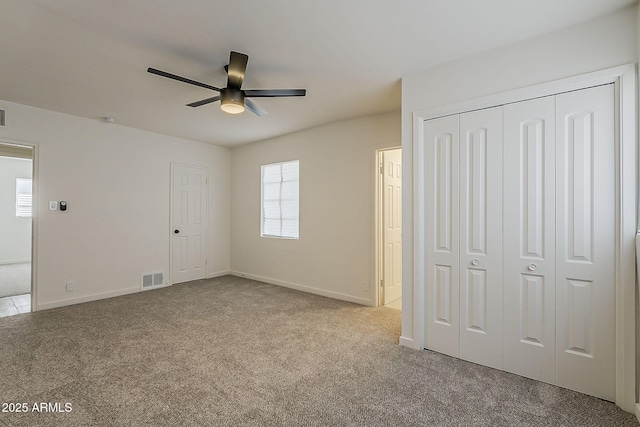 1616 E Pecan Rd, Phoenix, AZ 85040 - unfurnished bedroom with carpet, a ceiling fan, and a closet