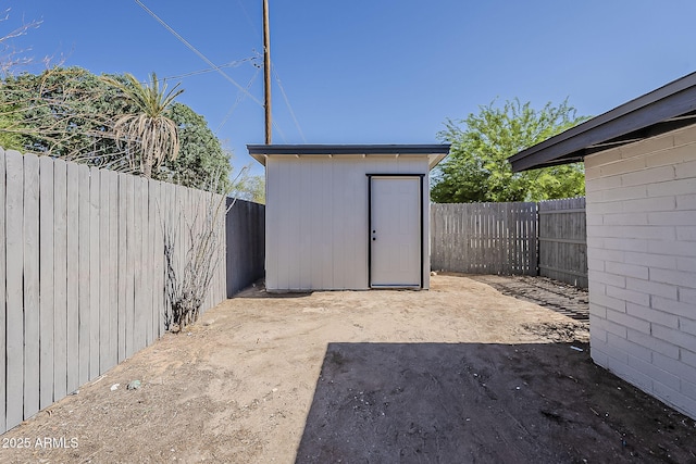 1616 E Pecan Rd, Phoenix, AZ 85040 - fenced backyard with a storage unit and a patio area