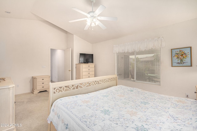 bedroom featuring ceiling fan, light carpet, and vaulted ceiling