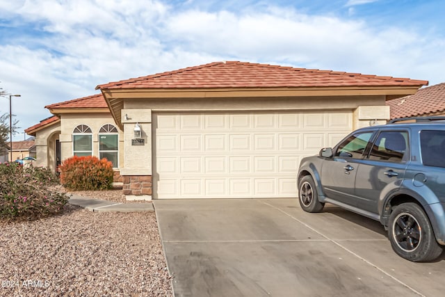 exterior space with a garage