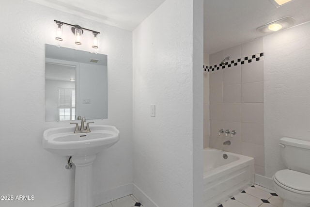 full bath with baseboards, toilet, washtub / shower combination, and tile patterned flooring