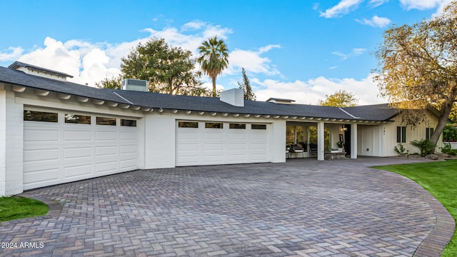 view of front of home with a garage