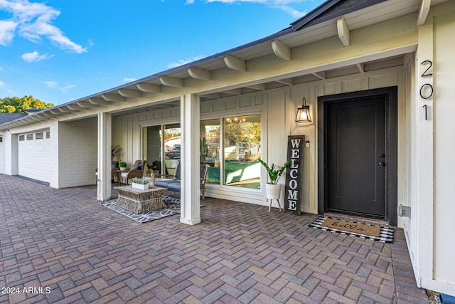 property entrance featuring a garage