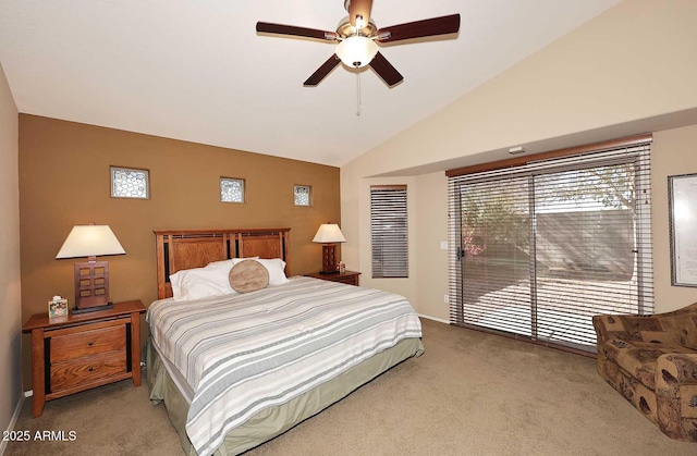 bedroom with lofted ceiling, ceiling fan, and light carpet