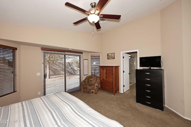 carpeted bedroom featuring ceiling fan and lofted ceiling