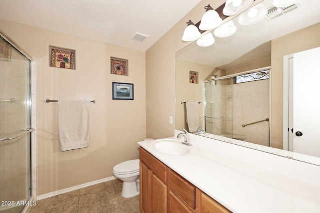 bathroom featuring toilet, an enclosed shower, and vanity