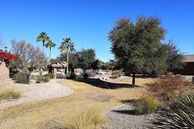 view of yard featuring a playground and a gazebo