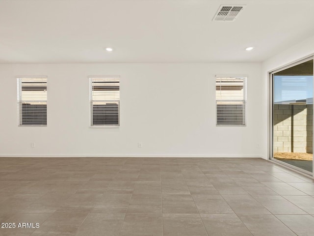 5573 S 246th Ave, Buckeye, AZ 85326 - unfurnished room with plenty of natural light and recessed lighting